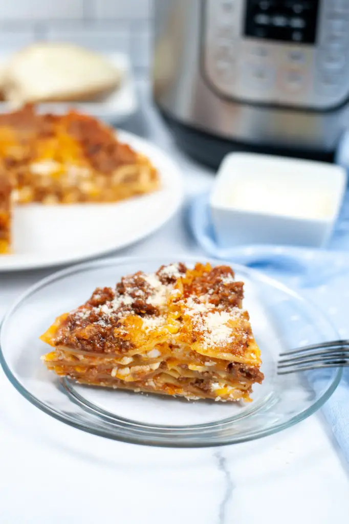 Slice of lasagna on a plate. 
