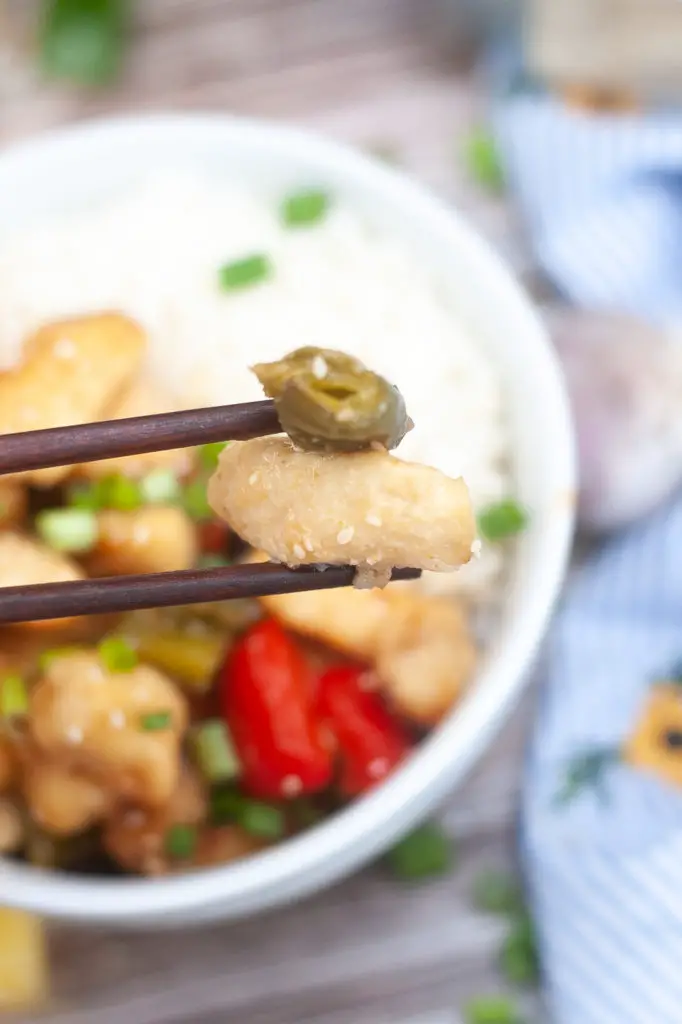 Chicken and vegetable in chopsticks,