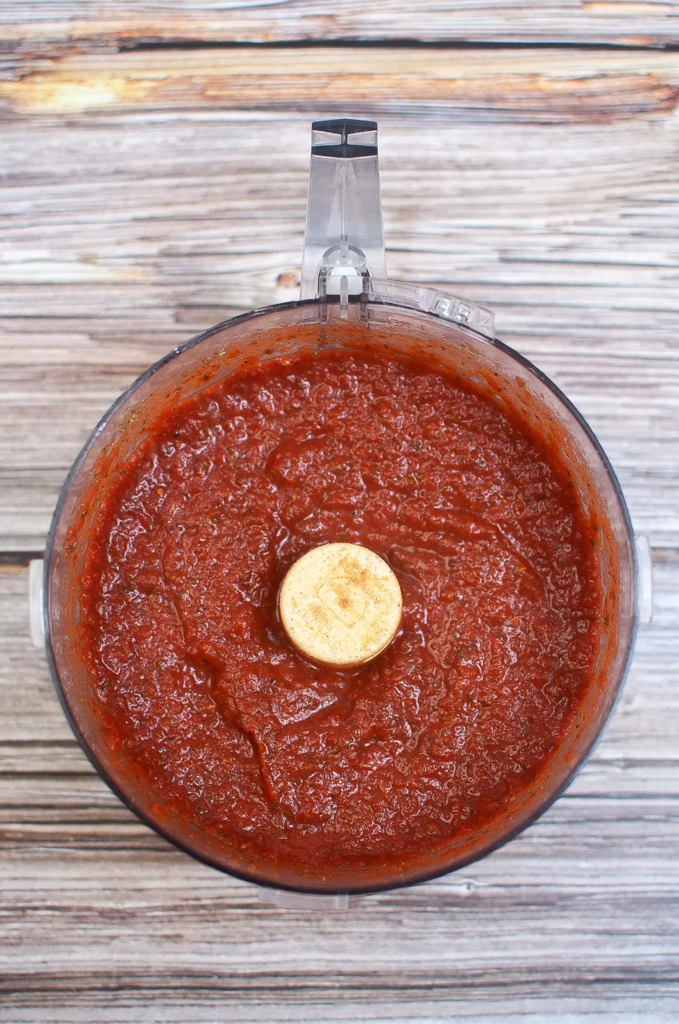 Prepared pasta sauce in a food processor. 