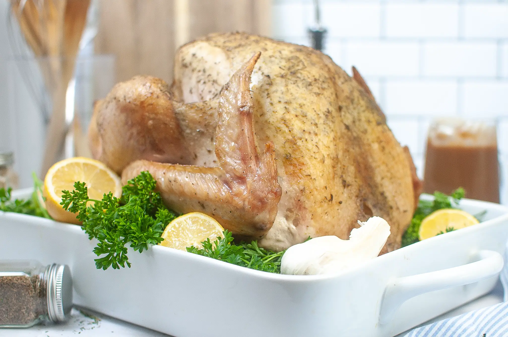 Roasted 15 lb turkey in roasting dish