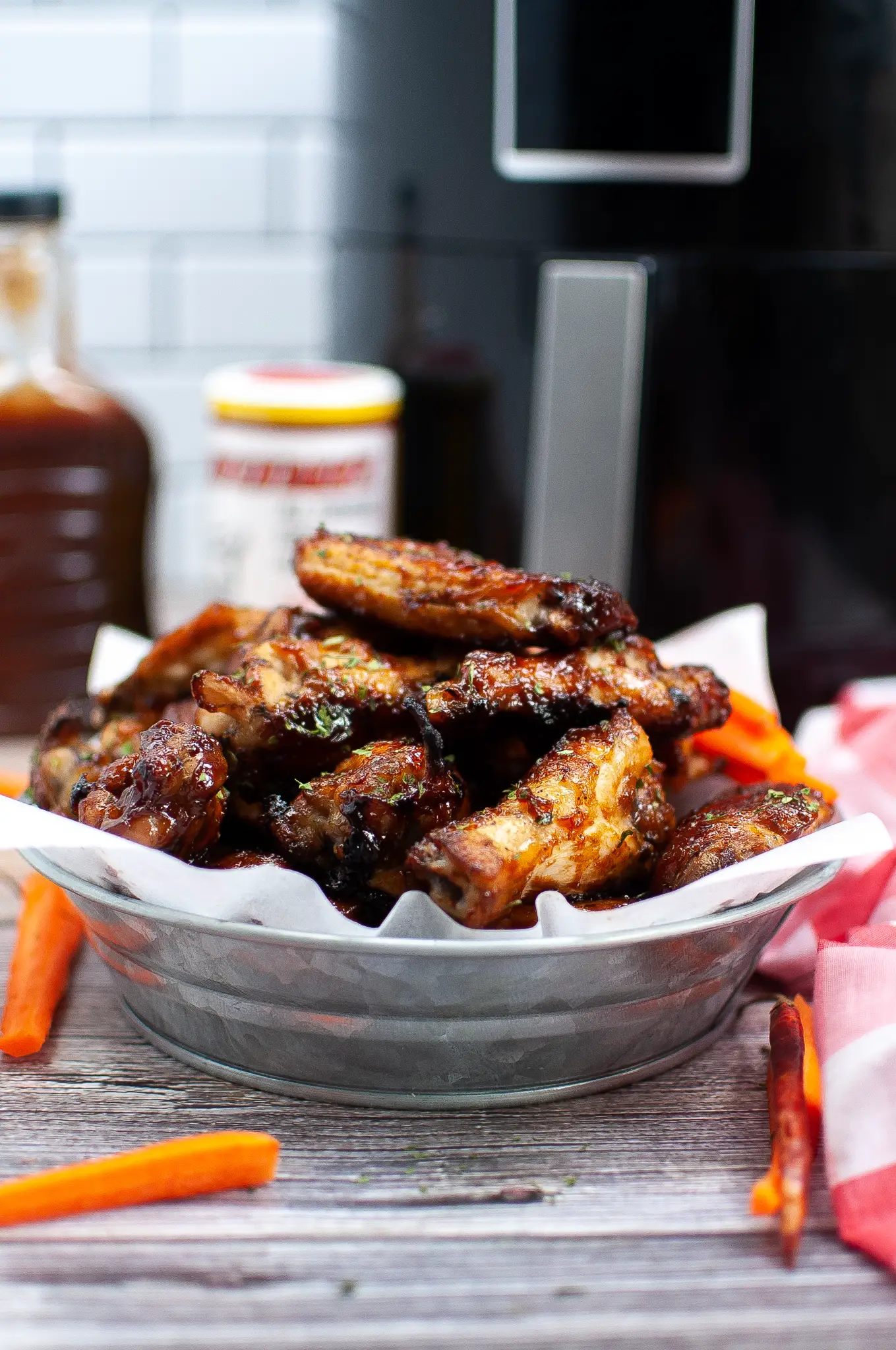 BBQ chicken wings in a bowl.